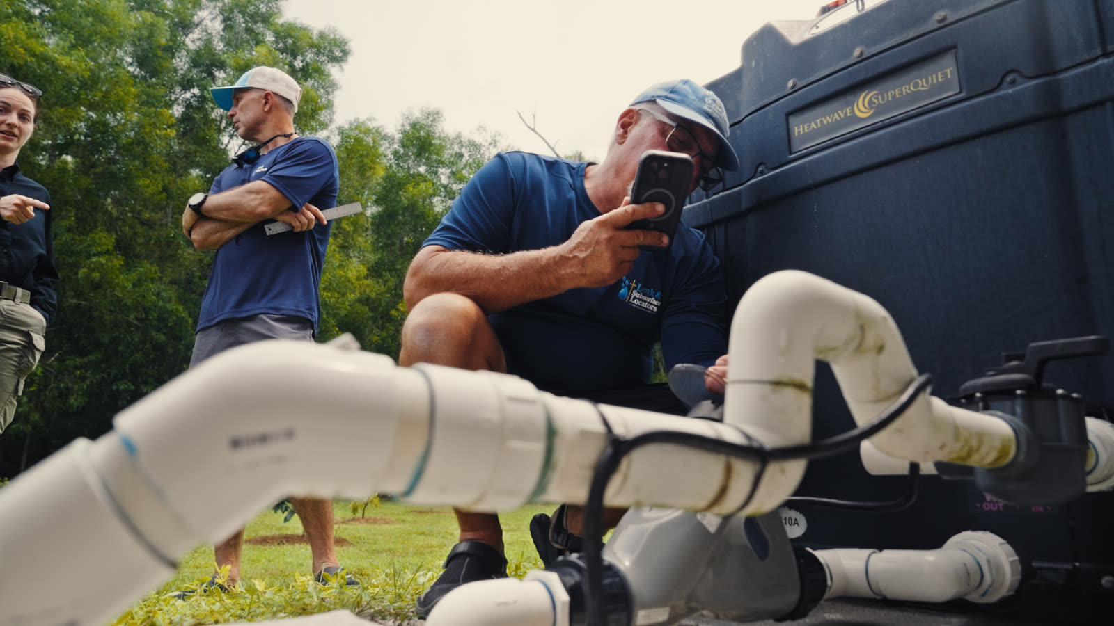 Team documenting an underground pool pipe locate during the Ride-Along