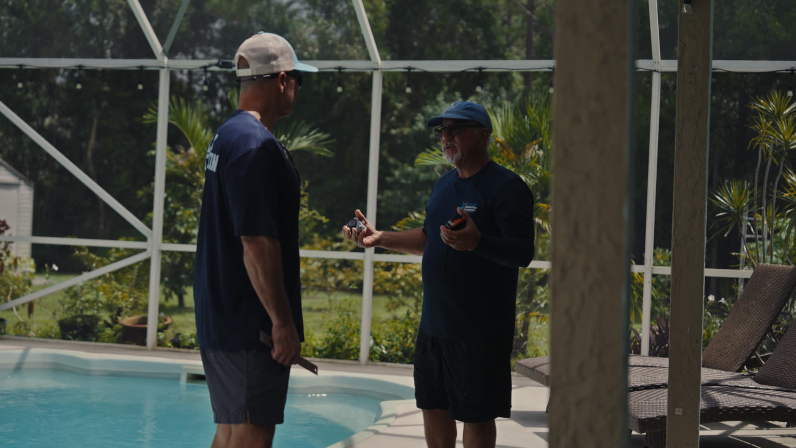 Jeff David briefing Tim poolside during the LBA 2-Day Ride-Along in Loxahatchee, Florida